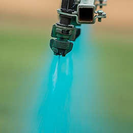 Close up photo of nozzle spraying liquid